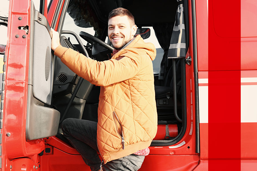 truck-driver-smiling-as-he-gets-into-truck-philadelphia-pa